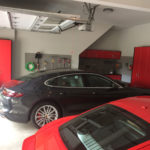 Custom Garage Cabinets Red with Slatwall Storage and Parked Cars
